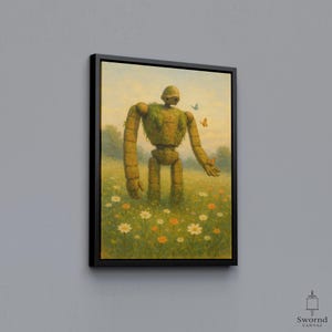 May include: A framed canvas print showing a robot-like figure in a field of wildflowers. The robot is covered in greenery, with butterflies fluttering around it. The artwork has a soft, painterly style, with a warm colour palette of greens, yellows, and blues.