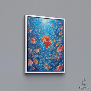 May include: A framed canvas wall art print featuring a vibrant underwater scene with a central figure of a small child with orange hair wearing a red dress, surrounded by numerous orange goldfish and colorful coral reefs in deep blue water.