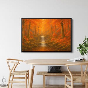 Könnte beinhalten: Gerahmter Leinwanddruck, der eine lebendige Herbstwaldszene darstellt. Das Kunstwerk zeigt einen Wasserfall, der in einen ruhigen Bach stürzt, umgeben von Bäumen mit feurigem orangefarbenem und rotem Laub. Das Gemälde ist in einem schwarzen Rahmen gefasst.