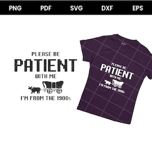 May include: A dark purple t-shirt with a white graphic that reads "PLEASE BE PATIENT WITH ME, I'M FROM THE 1900s." The design includes a covered wagon and oxen. The shirt has a grid pattern.