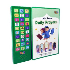 May include: A green electronic learning device and a book titled "Let's Learn Daily Prayers." The book cover features cartoon illustrations of children and prayer rugs. The device has multiple colourful buttons with icons.