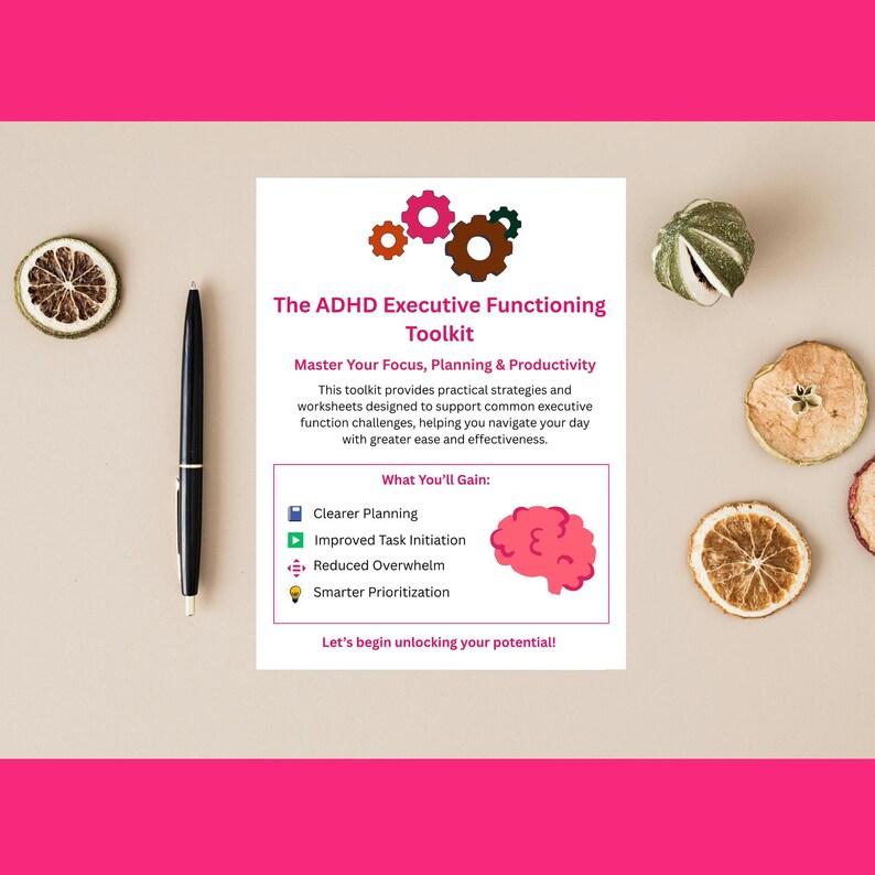 May include: A white card with the text "The ADHD Executive Functioning Toolkit" and a list of benefits. A black pen and dried fruit slices are arranged around the card on a beige surface.