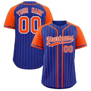 May include: A blue baseball jersey with orange sleeves and accents. The jersey has vertical orange stripes and the text "Yourteams" on the front and "Your Name" and the number "00" on the back. The jersey has a button-up front.