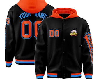 May include: Black hooded jacket with orange lining and accents. Features the number "00" in orange with a light blue outline on the front and back. The back has "YOUR NAME" above the number. The sleeves have text and a logo.