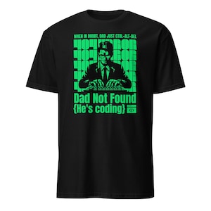 May include: Black t-shirt with a green graphic of a man typing on a keyboard, with the text "WHEN IN DOUBT, DAD JUST CTRL-ALT-DEL" above the image. Below the image is the text "Dad Not Found {He's coding}".