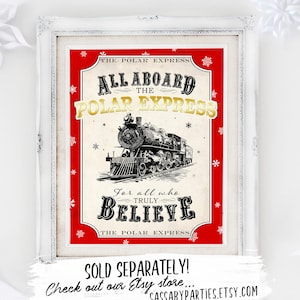May include: A red and white printable sign with a black and white illustration of a train. The sign says "The Polar Express" and "All Aboard The Polar Express" in gold lettering. The sign also says "For all who truly believe" and "The Polar Express".