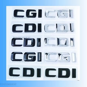 Pode incluir: Uma folha de autocolantes com os textos "CGI" e "CDI" em preto e cromado. Os autocolantes estão dispostos em filas e colunas sobre um fundo branco. O texto "FONIX24SHOP" é visível.