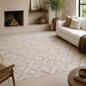 Koeienhuid vloerkleed 5 x 8 ft (152 x 244 cm) met geometrisch 3D-patroon, handgemaakt, ivoorkleurig en zwart.