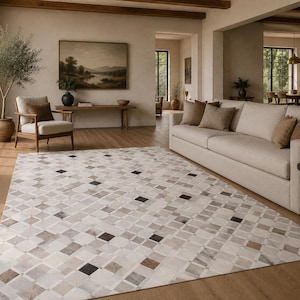 Koeienhuid vloerkleed 5 x 8 ft (152 x 244 cm) met geometrisch 3D-patroon, handgemaakt, ivoorkleurig en zwart.