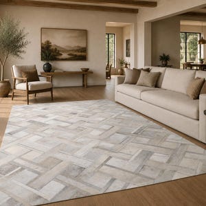 Koeienhuid vloerkleed 5 x 8 ft (152 x 244 cm) met geometrisch 3D-patroon, handgemaakt, ivoorkleurig en zwart.