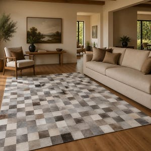 Koeienhuid vloerkleed 5 x 8 ft (152 x 244 cm) met geometrisch 3D-patroon, handgemaakt, ivoorkleurig en zwart.