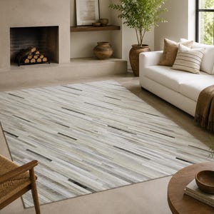 Koeienhuid vloerkleed 5 x 8 ft (152 x 244 cm) met geometrisch 3D-patroon, handgemaakt, ivoorkleurig en zwart.