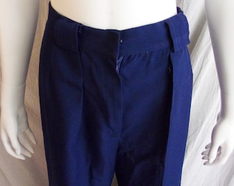May include: A pair of dark blue pants with a zipper fly and belt loops.