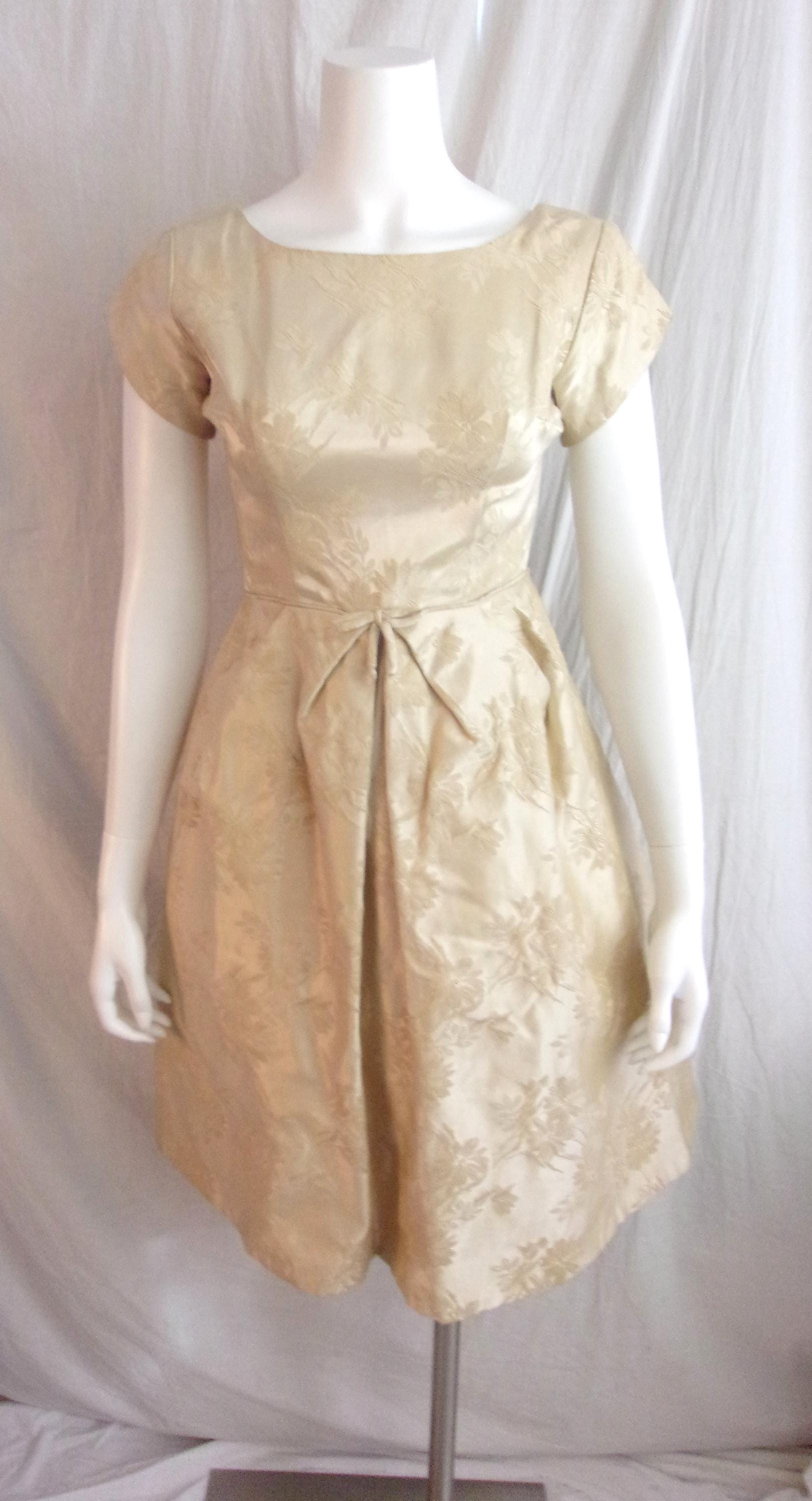 bridesmaid dresses that pair well with neutral florals Halter-Neck Bubble Mini Dress with Embellished Straps | main image 0