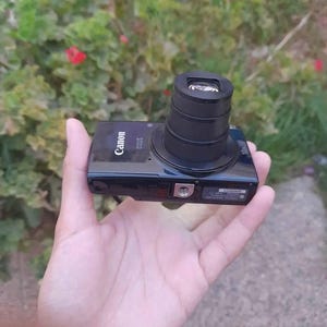 Appareil Photo Compact Canon IXUS 155 20MP 10x Zoom Occasion - Fonctionnel Avec Rayures