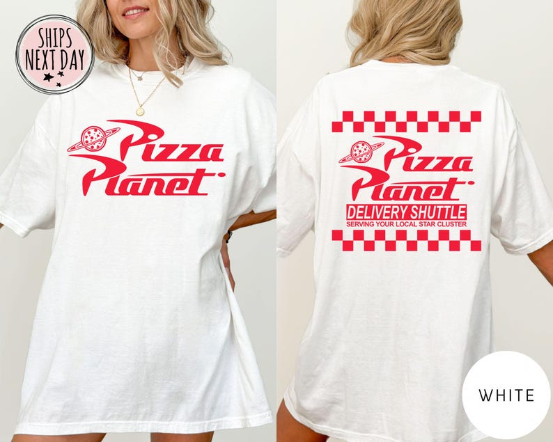 May include: White t-shirt featuring the red "Pizza Planet" logo on the front and back. The back of the shirt also displays the text "DELIVERY SHUTTLE" and "SERVING YOUR LOCAL STAR CLUSTER" in red, with a red and white chequered pattern.