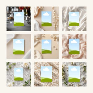 May include: Nine rectangular cards with a landscape design featuring a blue sky, white cloud, and green hills. The cards are arranged on various textured surfaces, including fabric and lace, with floral and decorative elements.