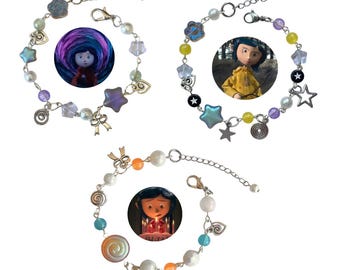 Coraline-inspirerade armband med orange och blå pärlor i glas