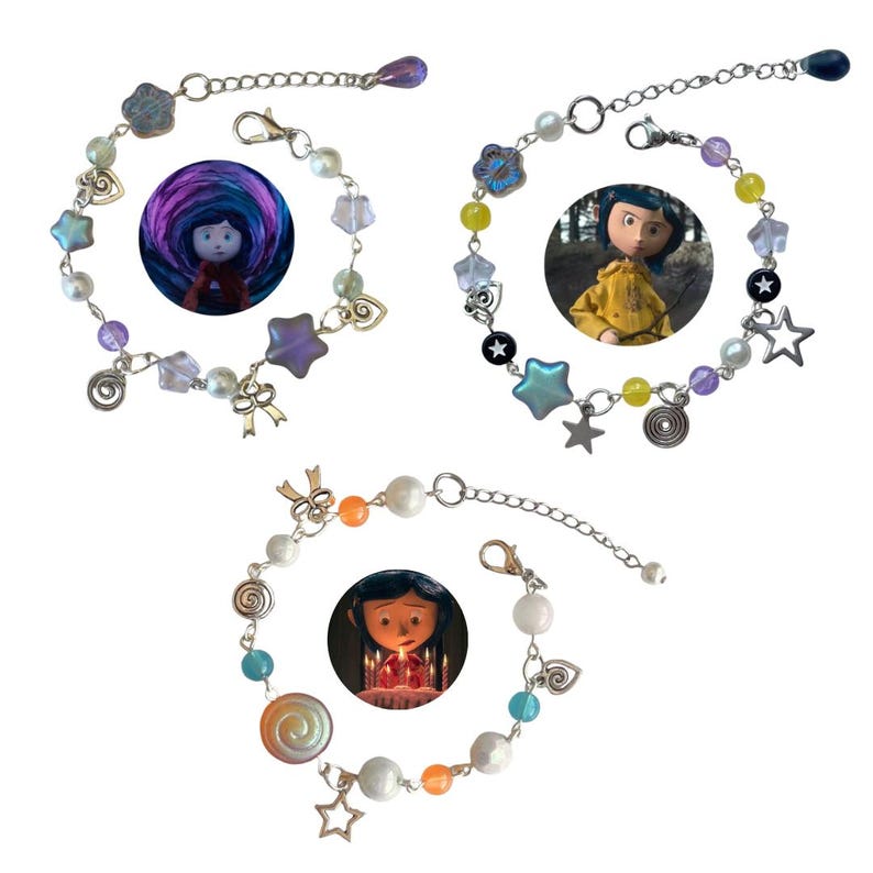 May include: Three beaded bracelets featuring images of a character from a movie. Each bracelet has a different design, with charms including stars, hearts, and spiral beads. The bracelets are made with silver-colored chains and clasps, and various colored beads.