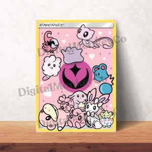 May include: A Pokemon card with a yellow border and the word "ENERGY" at the top. The card features a pink background with cartoon characters in various colours, including pink, purple, and blue. The background has white heart shapes.