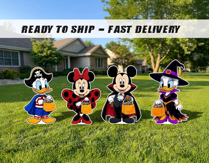 May include: Four cartoon character yard signs featuring a pirate duck, a ladybug mouse, a vampire mouse, and a witch duck. Each character holds a small orange candy bucket. The signs are displayed on a green lawn in front of a house.