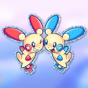 May include: Two cartoon character stickers. One has red accents and the other has blue accents. Both have yellow bodies, large ears, and a silver glitter border. The characters are smiling and winking at each other against a gradient blue and purple background.