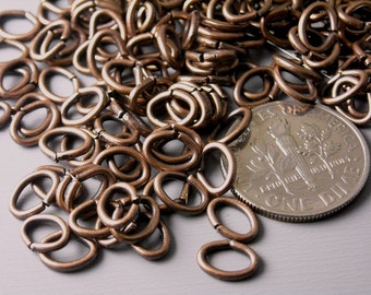 Open Cut Oval Jump Rings, Antique Copper Plated, 7mmx5mm, 22 gauge - 50 pieces
