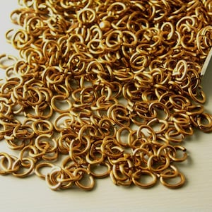 Antique Copper Oval Jump Rings, 4mm x 3mm, 22 gauge - 100 pieces