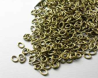 Open Cut Oval Jump Rings, Antique Bronze Plated, 4mmx2.5mm, 23 gauge - 50 pieces
