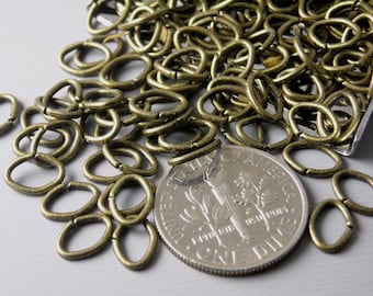 Open Cut Oval Jump Rings, Antique Bronze Plated, 7mmx5mm, 22 gauge - 50 pieces