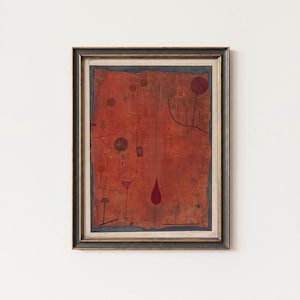 May include: Framed abstract artwork with a red background and black line drawings of organic shapes. The artwork features a dark wooden frame with a gold inner border. The artwork has a vintage aesthetic.