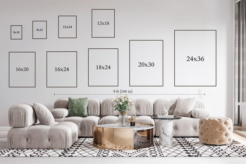 May include: A wall display guide featuring eleven rectangular frames with dimensions in inches: 8x10, 8x12, 11x14, 12x18, 16x20, 16x24, 18x24, 20x30, and 24x36. A dashed line indicates a width of 9 ft or 108 inches above a beige modular sofa.
