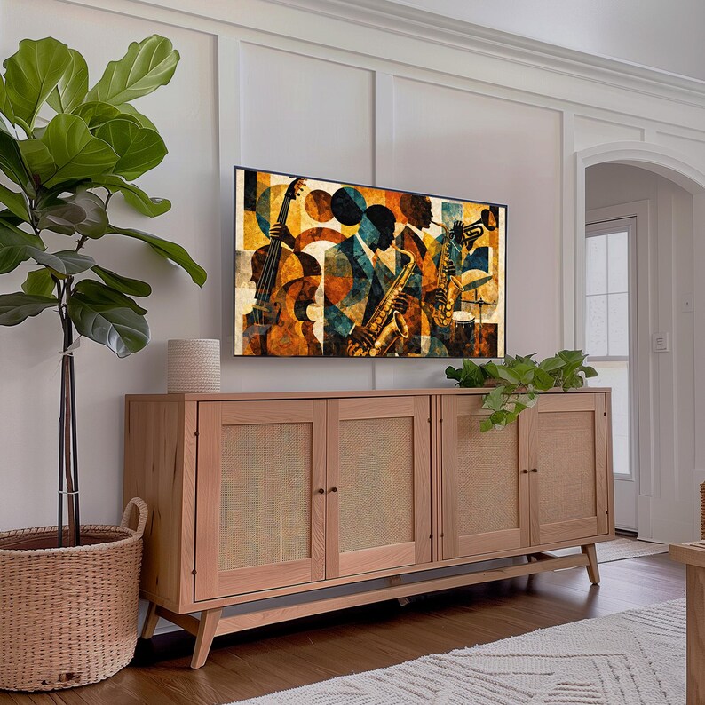 May include: A light wood cabinet with four doors and woven cane panels. A large flat-screen TV displays a colorful jazz-themed artwork. A potted plant and a woven basket are in the foreground, adding a touch of nature to the room.