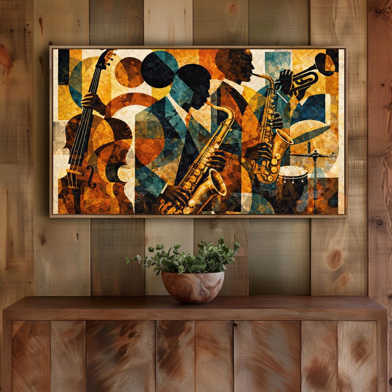 May include: Abstract art print featuring a jazz band. The artwork depicts musicians playing a cello, saxophone, trumpet, and drums. The color palette includes shades of brown, orange, yellow, and blue. The print is framed in a wooden frame.