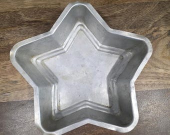 Vintage Star-cakevorm aluminium Montgomery Ward bakvorm standaardkwaliteit