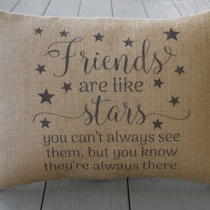 May include: A burlap pillow with the text "Friends are like stars. You can't always see them, but you know they're always there." printed in black.
