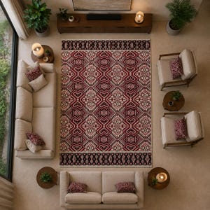 Red and cream geometric rug with black decorative border and handmade texture