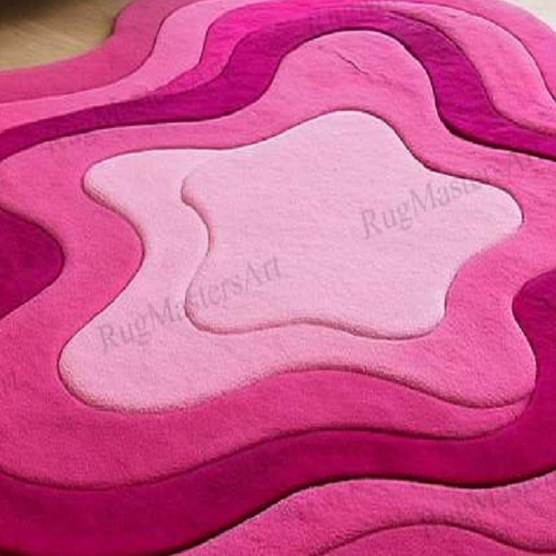 Abstract pink wave rug with layered organic design, hand tufted fluffy area rug in vibrant pink tones, modern funky carpet for aesthetic bedroom, glam living room and trendy feminine decor.