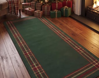 May include: A rectangular area rug featuring a solid dark green center bordered by a classic red, gold, and dark green plaid pattern. The rug has a finished edge and is positioned on a wooden floor, showcasing a traditional textile design.