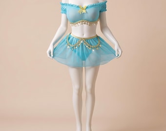 May include: A two-piece light blue outfit featuring an off-the-shoulder ruffled crop top with a small yellow bow and a matching mini skirt. Both pieces are adorned with gold-toned dangling coin trim along the waist and neckline edges.