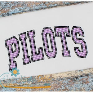 May include: Embroidered design of the word "PILOTS" in a varsity style font. The letters are filled with a purple and white gingham pattern and outlined in black.