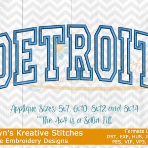 May include: Blue embroidered "DETROIT" design with a stitched outline, set against a white chevron pattern background. The design includes the text "Applique Sizes: 5x7, 6x10, 8x12 and 8x14".