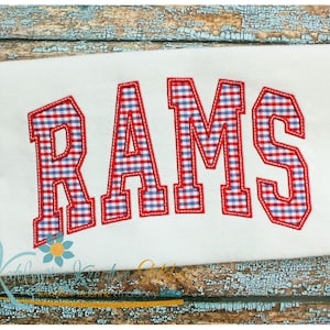 May include: Red and blue gingham "RAMS" lettering in a varsity style font. The letters are outlined in red and have a white border.