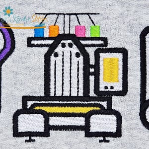 May include: Embroidered design featuring sewing tools and equipment. Includes purple scissors, a sewing machine with colorful thread spools, and a large safety pin. The design is in black, white, yellow, blue, orange, pink, and green on a gray background.