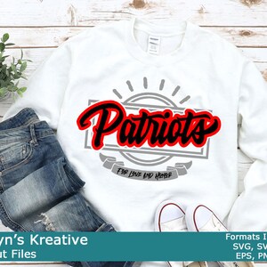 May include: White sweatshirt with a red and black graphic that says "Patriots" with a grey circle and ribbon that says "For Love and Honour".