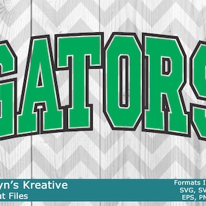 May include: A green and black graphic design of the word "GATORS" in a bold, blocky font. The text is on a white and grey chevron background. The text "Katelyn's Kreative SVG Cut Files" is at the bottom left of the image. The text "Formats Included: SVG, SVG3, DXF EPS, PNG & JPG" is at the bottom right of the image.