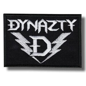 May include: Black rectangular patch with the word "DYNAZTY" in white, stylized lettering. Below the word is a white "D" with lightning bolt wings. The patch is likely for a band or clothing.