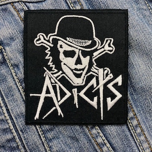 May include: A set of three ceramic mugs with a speckled, matte finish in cream, light brown, and dark brown. Each mug has a simple design and a rounded handle.