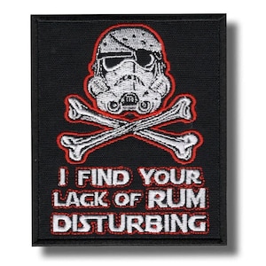 May include: Black rectangular patch featuring a white Stormtrooper helmet with a red outline, crossed bones, and the text "I FIND YOUR LACK OF RUM DISTURBING" in white and red. The patch has a black border.
