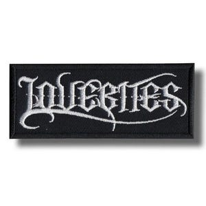 May include: Black rectangular patch with the word "Inferites" embroidered in white, gothic-style lettering. The patch has a black border and a white background. The text is in a stylized, ornate font.